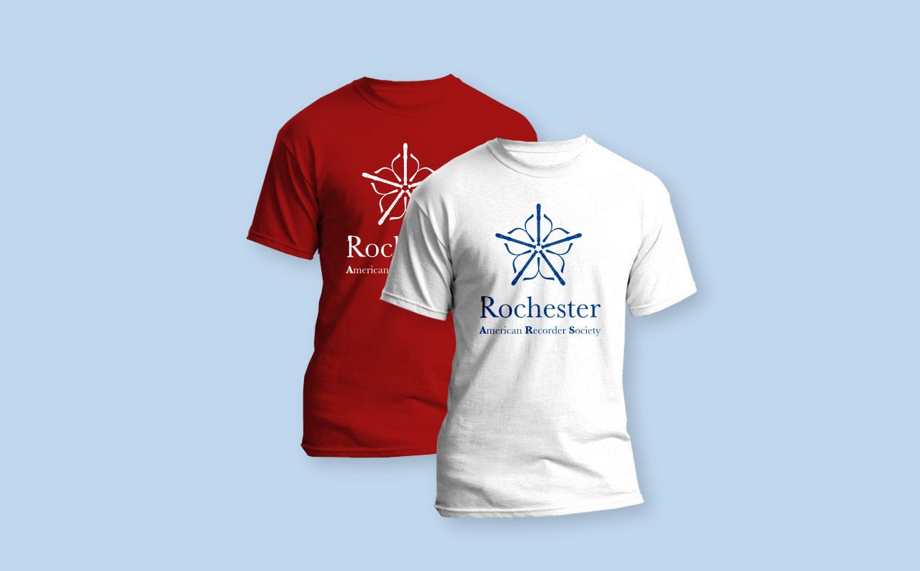 The logo represented on two t-shirts, showing differing colorings. The first is a dark blue logo on a white t-shirt, and the second is a white logo on a deep red t-shirt. Both logos have text under them reading “Rochester Recorder Society.”